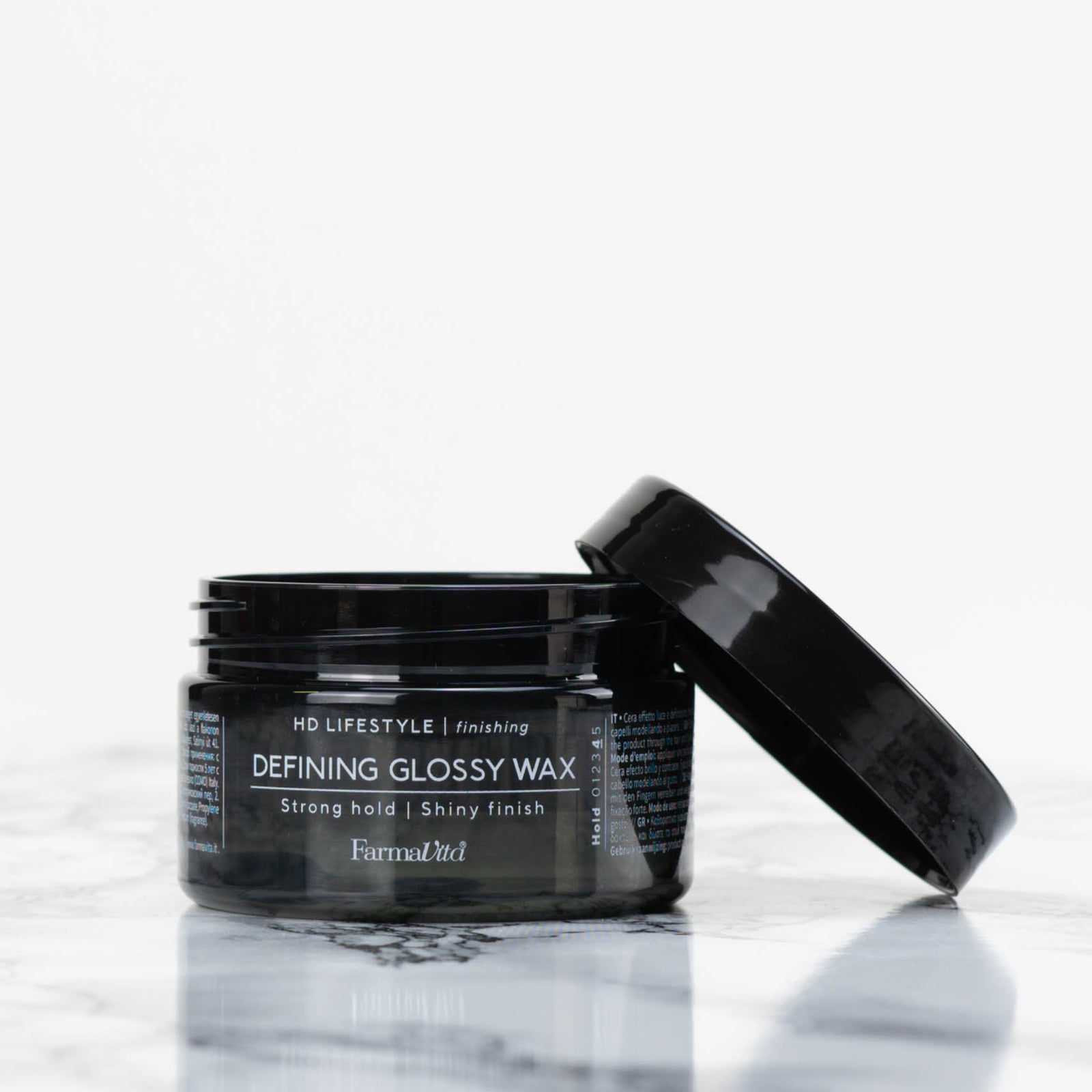 Defining Glossy Wax  cera de brillo HD Lifestyle by Farmavita